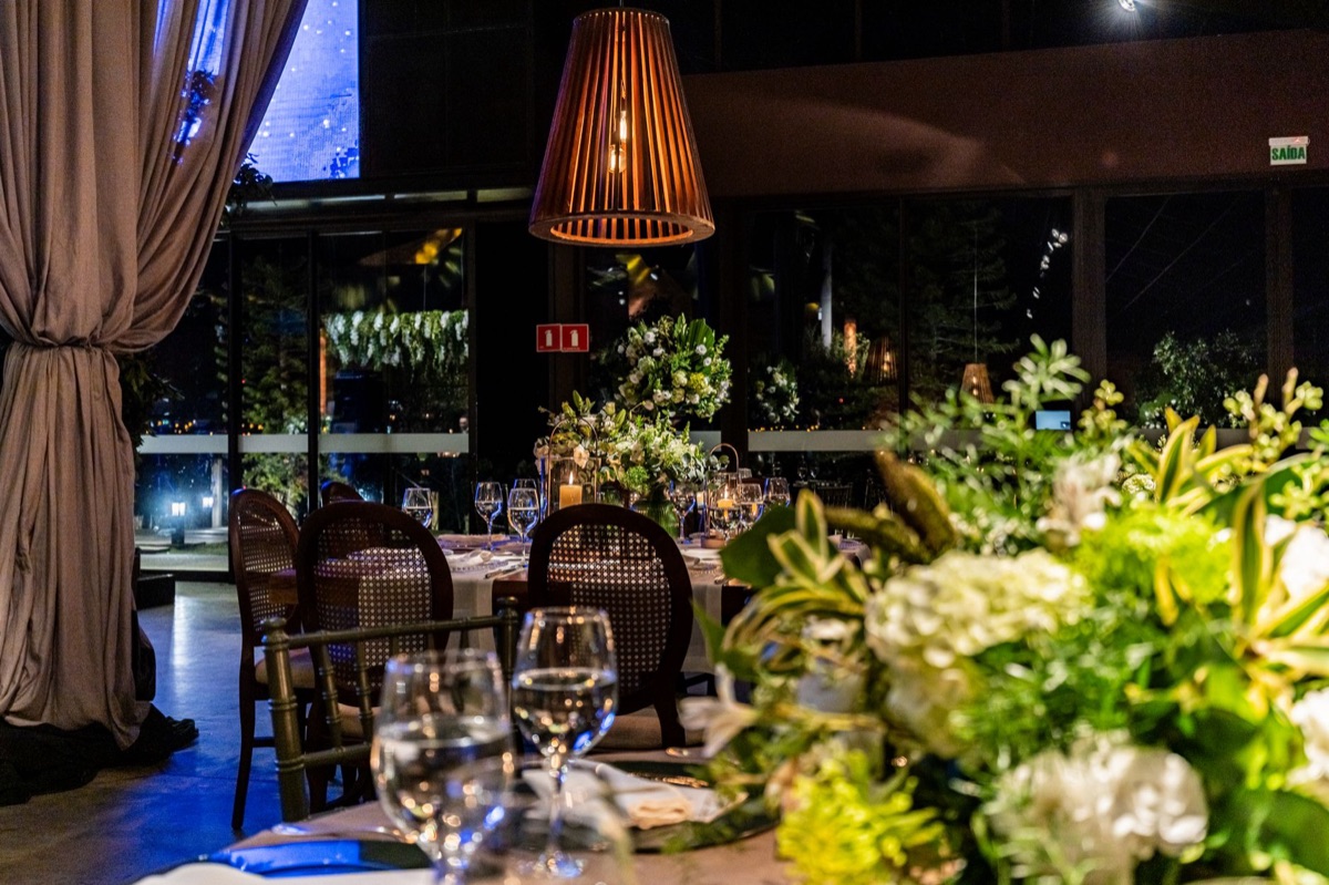 Luxury restaurant dining table with tropical flowers