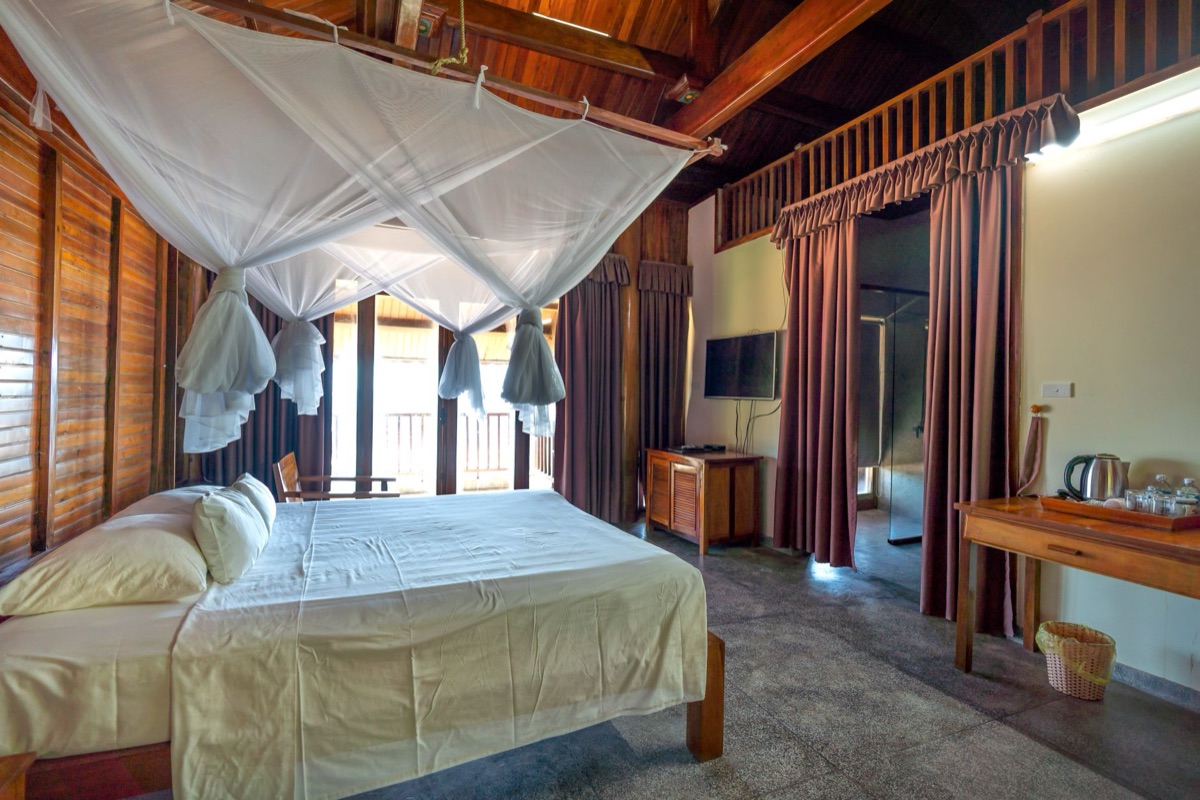 Luxury hotel room with private balcony view