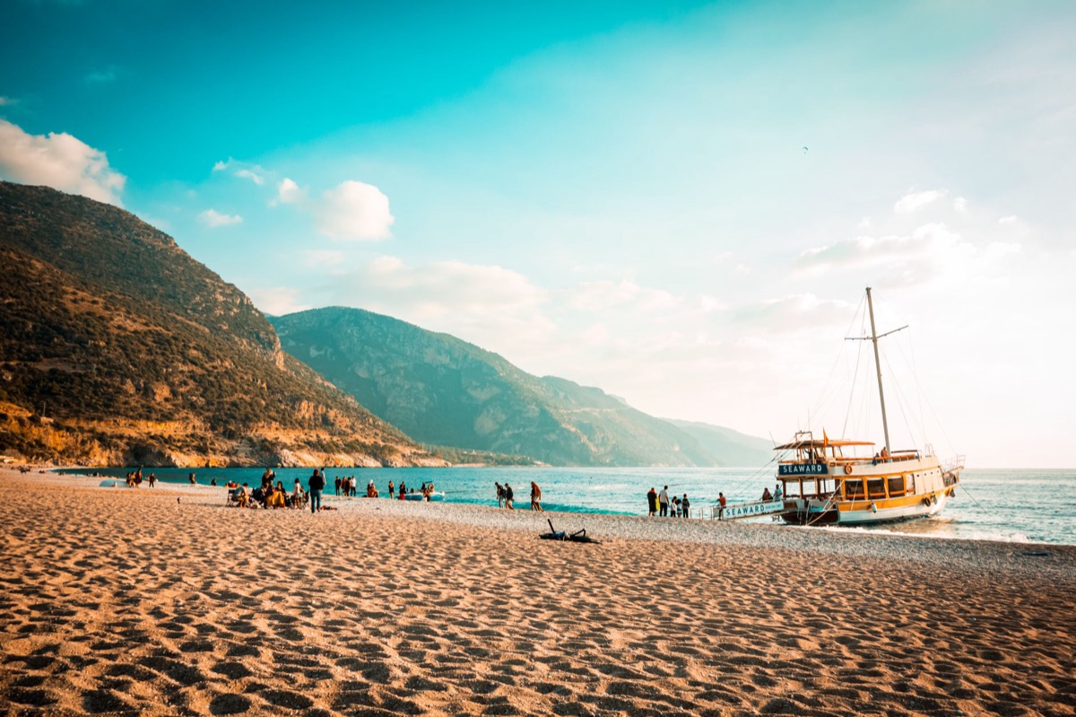Sunset cruise with white sand beach