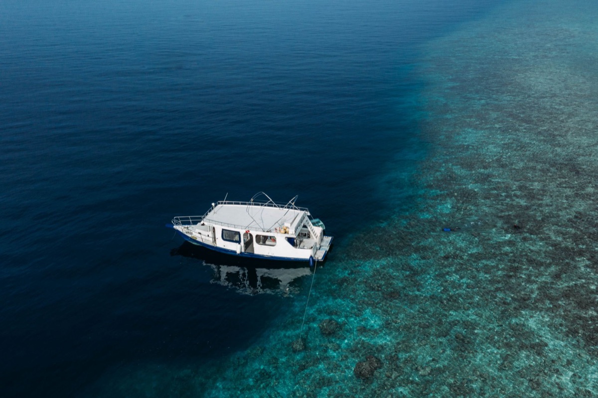 sunset cruise boat in lagoon
