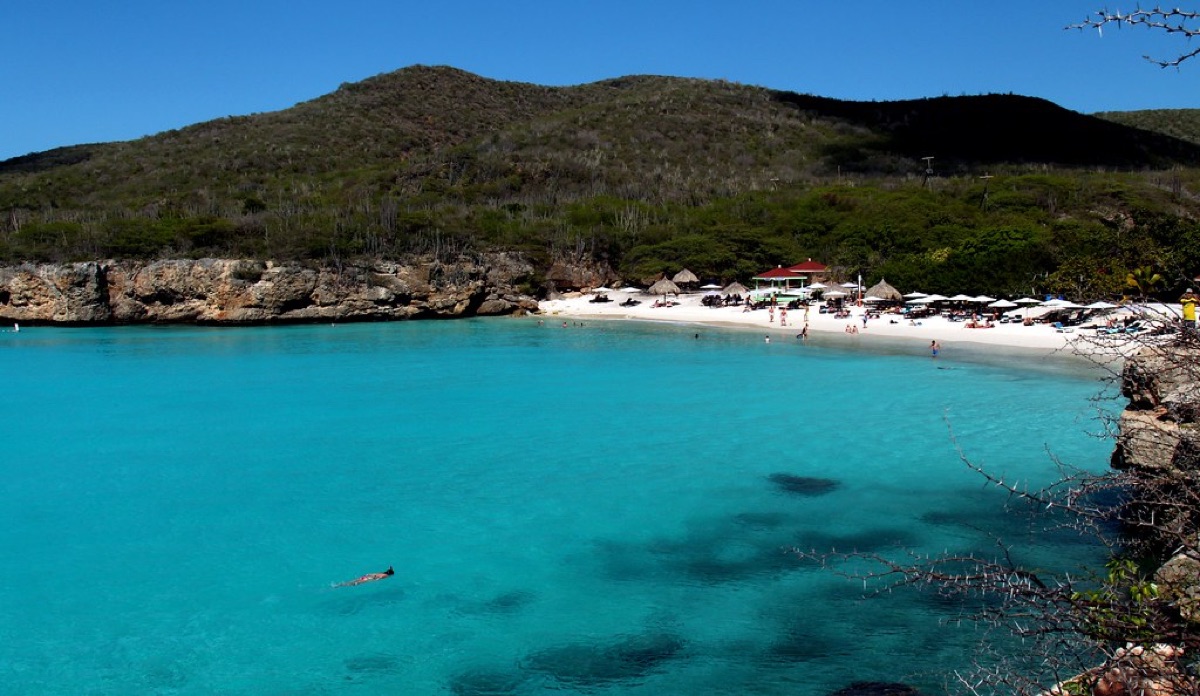 white sandy beach with turquoise water