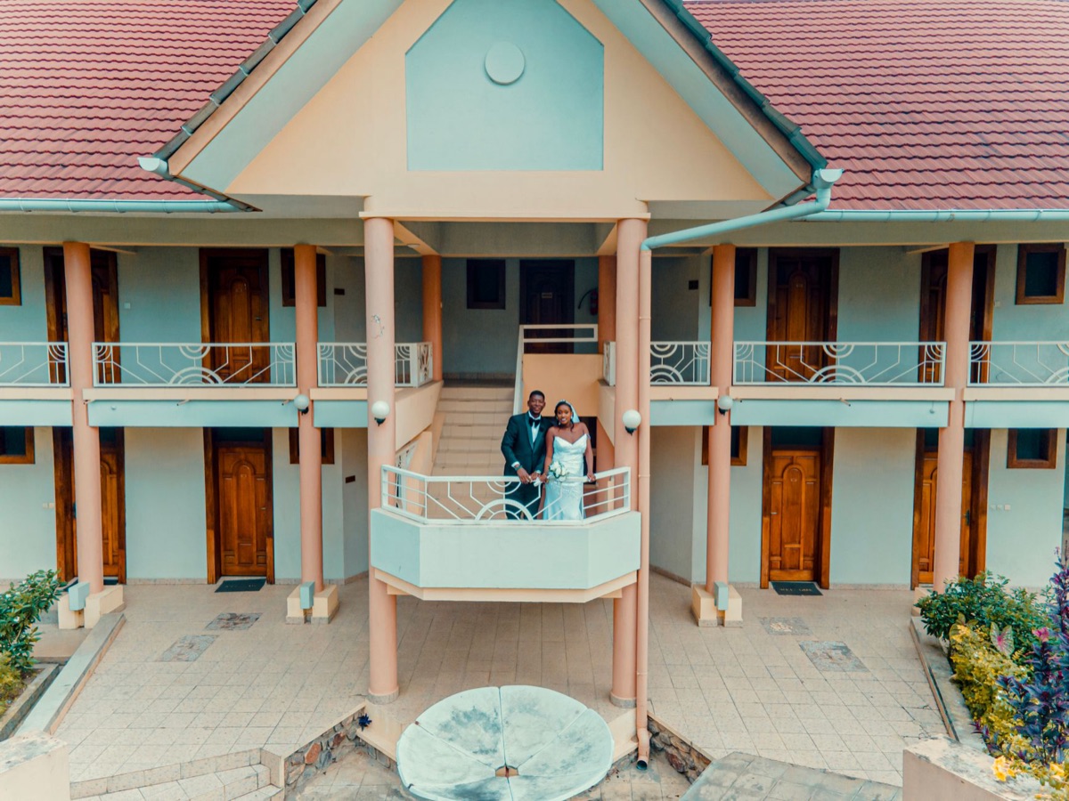 couple in front of luxury resort